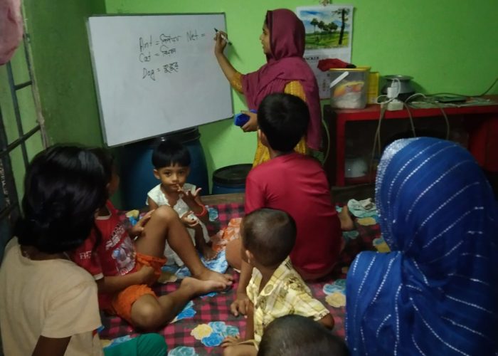 Afsana Apa is engaged in teaching children.
